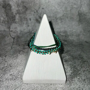 N22. PARIS!! IKITA STAMPED MULTI‎ STRAND BRACELET GOLD TONE CLOSURE TEAL/BLUE